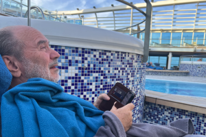 Alex watching soccer not bored aboard floating city